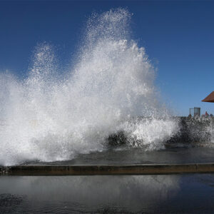 huge wave crashing onshore during a King Tide in Pacifica