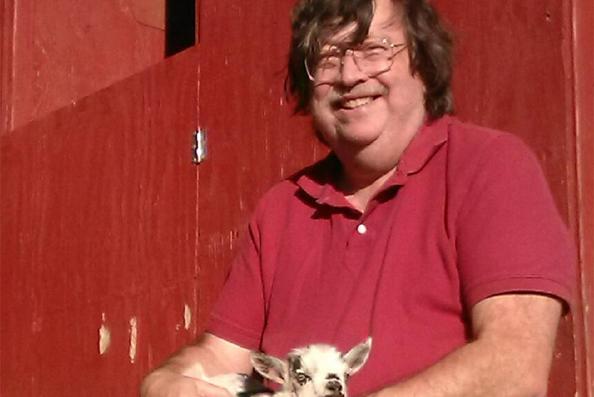 Peter Ruddock with Fonzie the baby goat